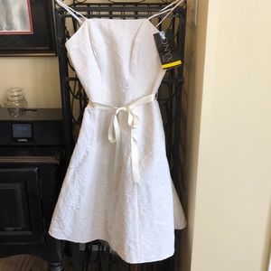 Above the knee strapless evening dress